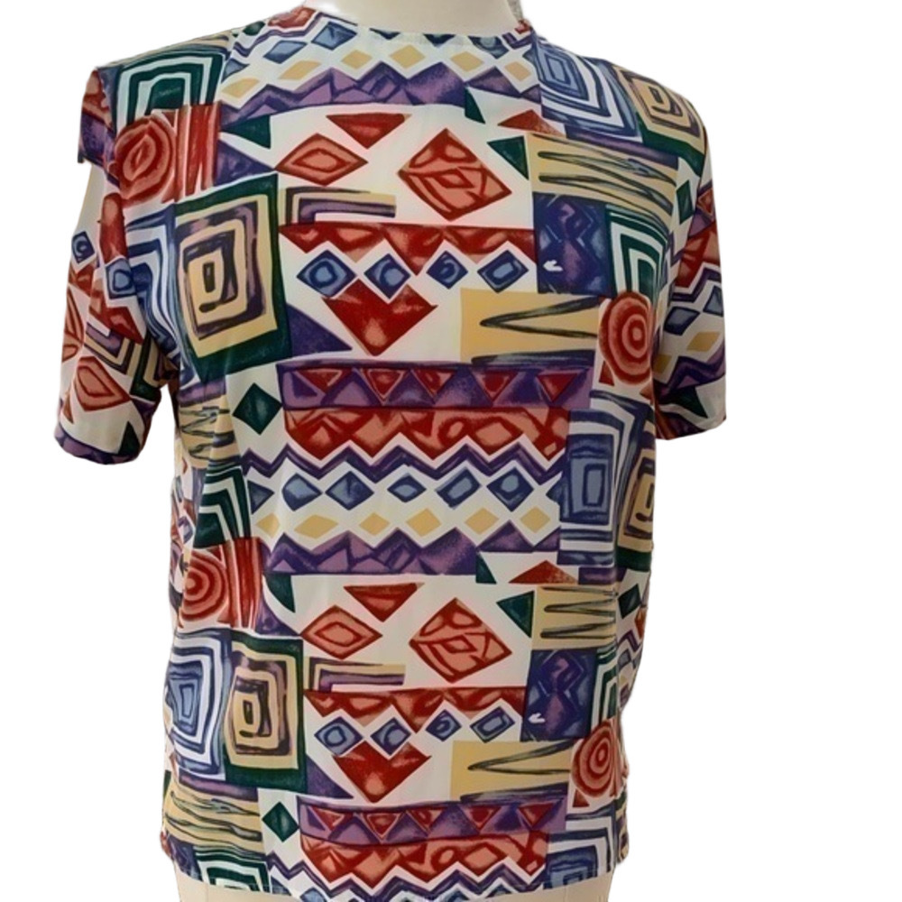 33 Dover St. Abstract print top with matching capris (free) with top purchase.